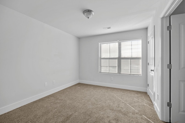 unfurnished room with carpet