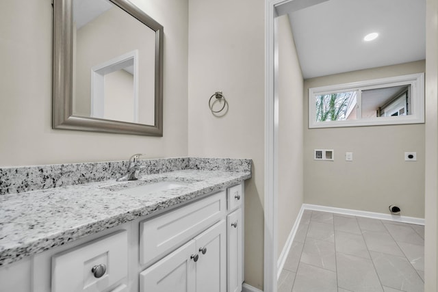 bathroom featuring vanity and tile patterned flooring