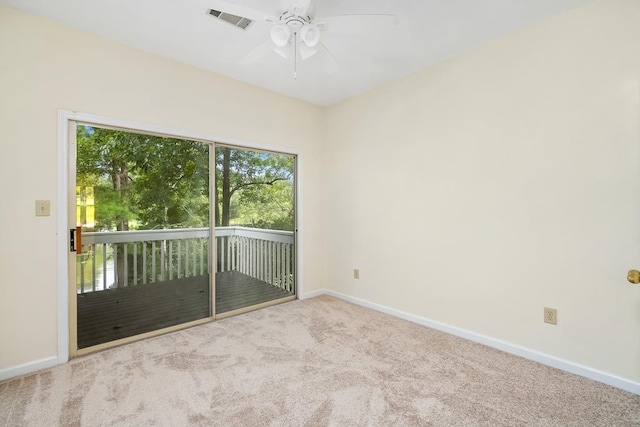 unfurnished room featuring carpet and ceiling fan