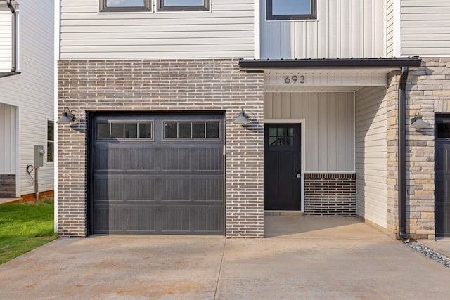 entrance to property featuring a garage