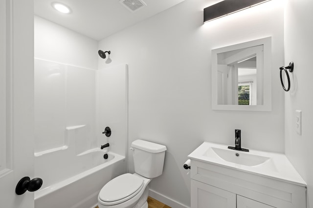 full bathroom featuring toilet, vanity, and shower / tub combination