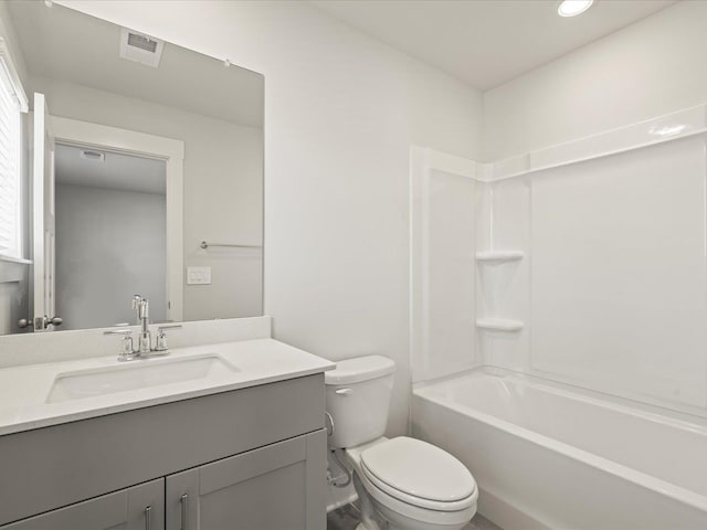 bathroom featuring bathtub / shower combination, visible vents, vanity, and toilet