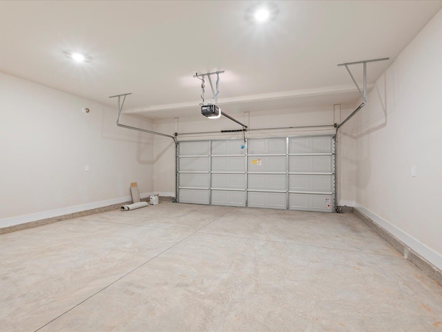 garage featuring baseboards and a garage door opener