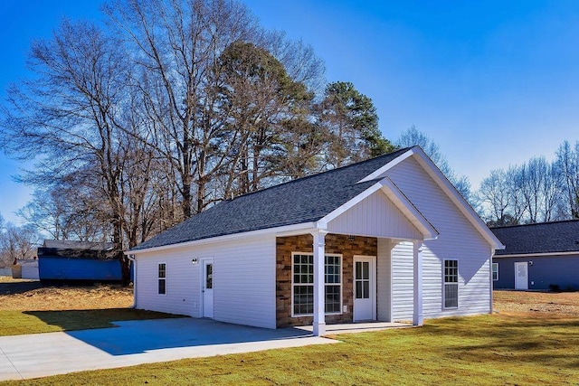 exterior space with a lawn