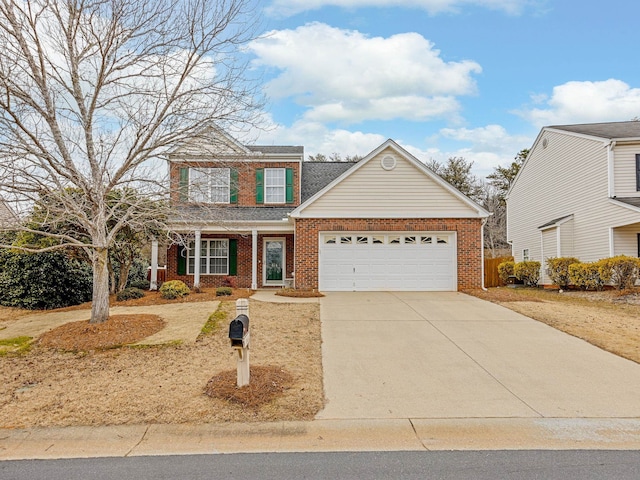 view of front of property featuring a garage