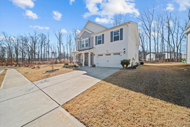 view of front facade with a garage and a front lawn