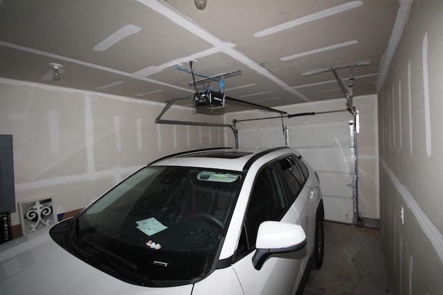 garage featuring a garage door opener