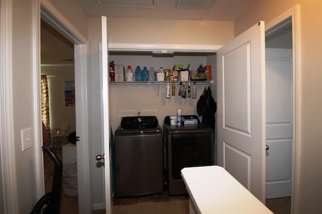 washroom featuring independent washer and dryer