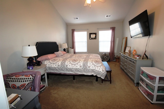 bedroom featuring lofted ceiling, carpet floors, and ceiling fan