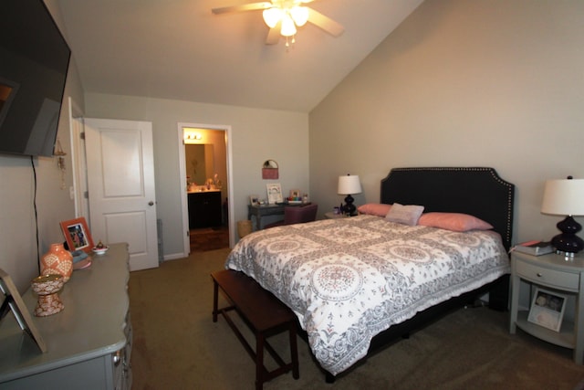 carpeted bedroom with connected bathroom, vaulted ceiling, and ceiling fan