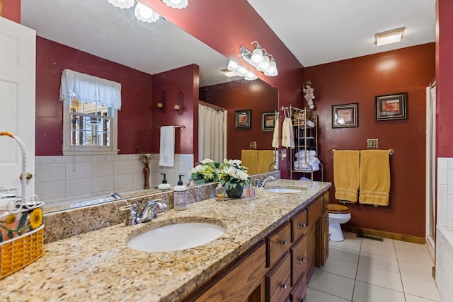 bathroom featuring decorative backsplash, tile patterned flooring, vanity, toilet, and a shower with curtain