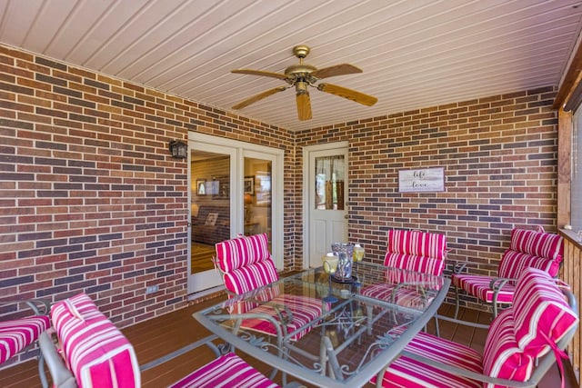 view of patio featuring ceiling fan