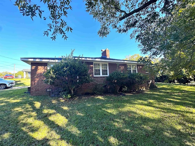 exterior space with a front yard