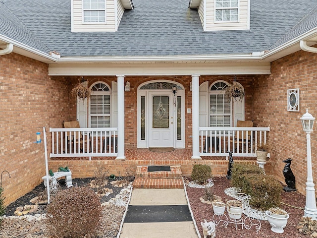 doorway to property with covered porch