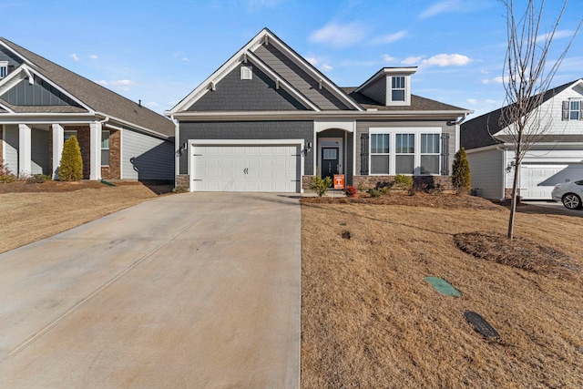 craftsman-style home with a garage and a front yard