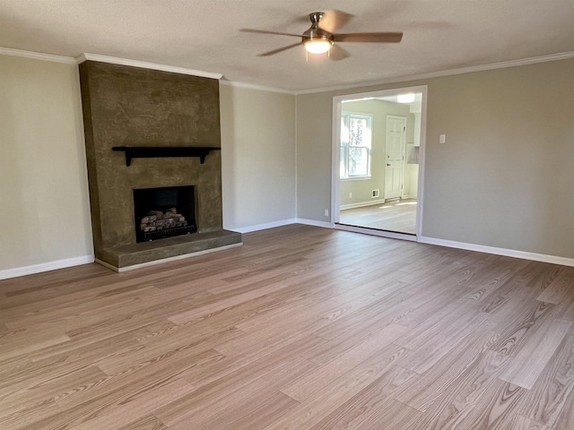 115 Fernbrook Cir, Spartanburg, SC 29307 - unfurnished living room with ornamental molding, a fireplace, wood finished floors, and baseboards