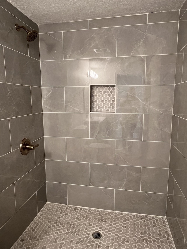 115 Fernbrook Cir, Spartanburg, SC 29307 - full bathroom featuring a textured ceiling and tiled shower
