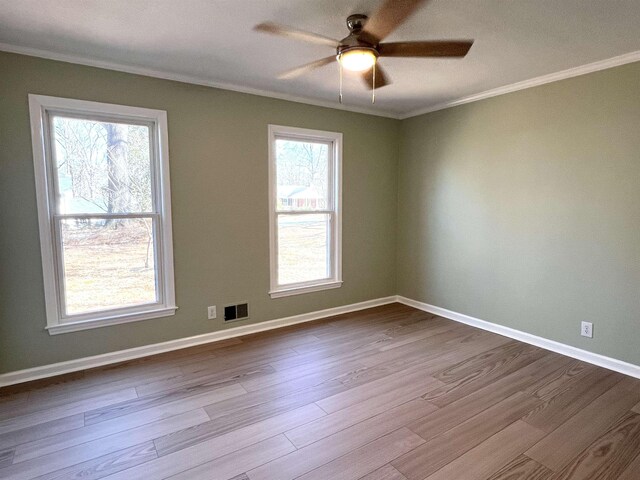 115 Fernbrook Cir, Spartanburg, SC 29307 - unfurnished room featuring ornamental molding, dark wood-style flooring, visible vents, and baseboards