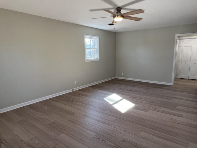 115 Fernbrook Cir, Spartanburg, SC 29307 - empty room featuring dark wood-style flooring, ceiling fan, and baseboards