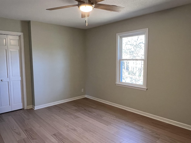 115 Fernbrook Cir, Spartanburg, SC 29307 - unfurnished bedroom with a closet, dark wood-style flooring, and baseboards