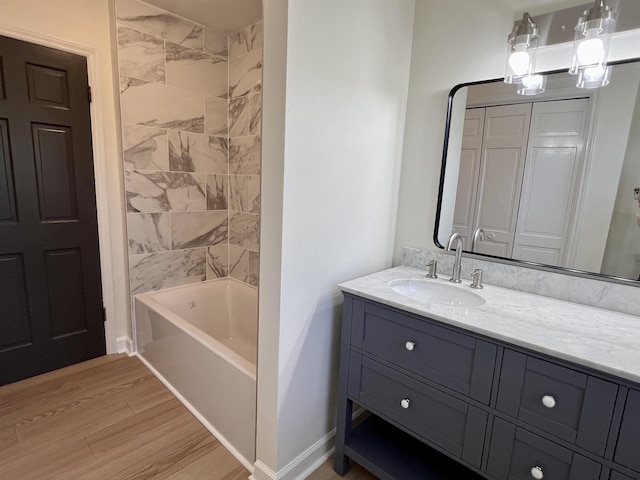 115 Fernbrook Cir, Spartanburg, SC 29307 - bathroom with baseboards, vanity, shower / bathtub combination, and wood finished floors