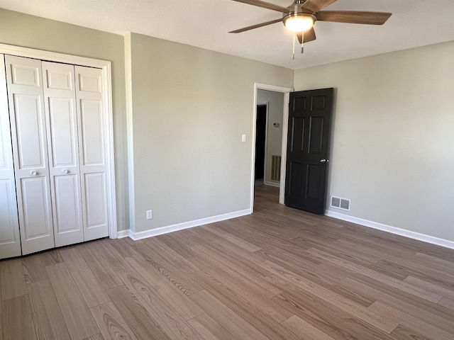 115 Fernbrook Cir, Spartanburg, SC 29307 - unfurnished bedroom featuring visible vents, baseboards, and wood finished floors