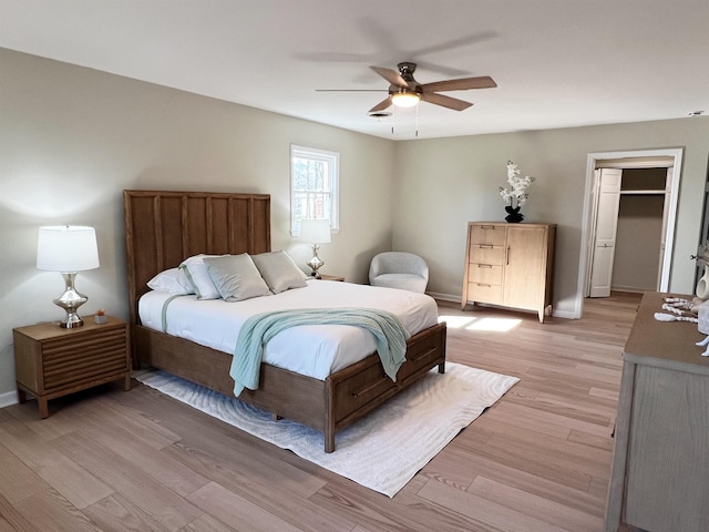 115 Fernbrook Cir, Spartanburg, SC 29307 - bedroom featuring light wood-type flooring, a walk in closet, ceiling fan, and baseboards