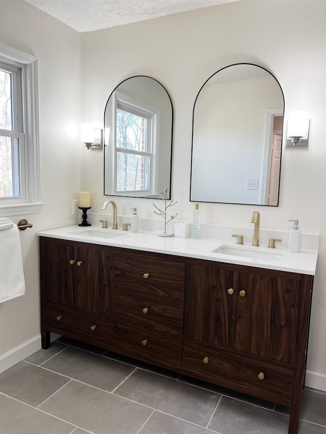 115 Fernbrook Cir, Spartanburg, SC 29307 - bathroom featuring tile patterned flooring, a sink, and a wealth of natural light