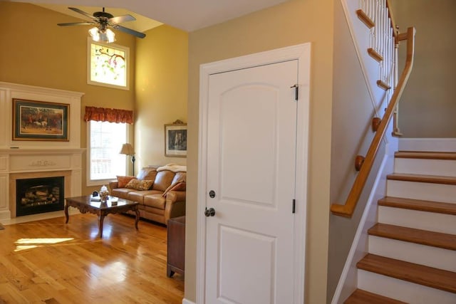 interior space with light hardwood / wood-style floors and ceiling fan