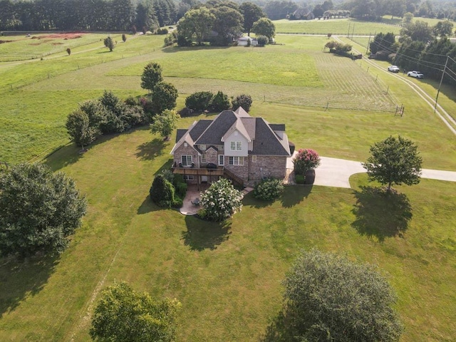 birds eye view of property featuring a rural view