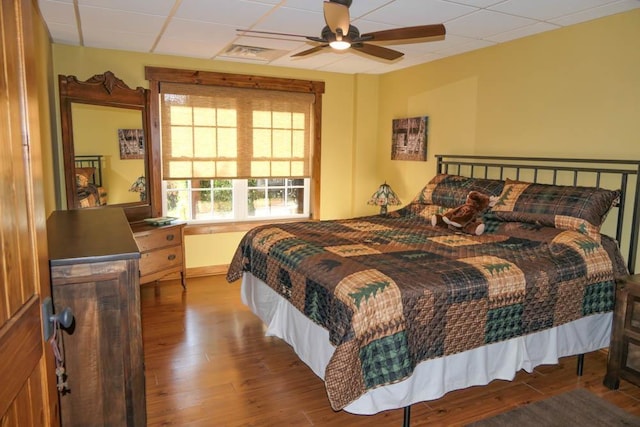 bedroom featuring ceiling fan and hardwood / wood-style floors