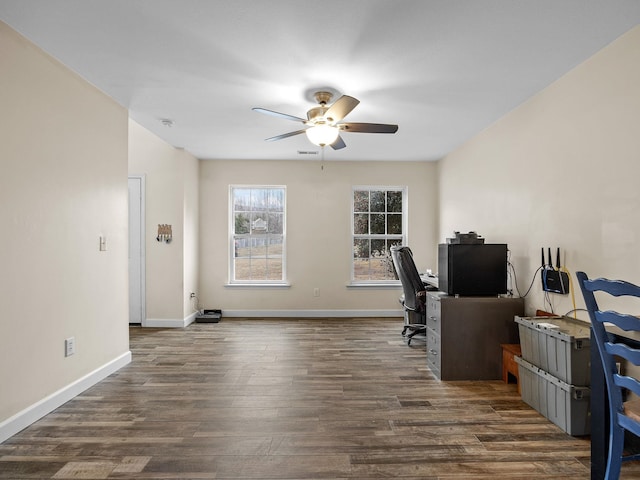 office area with dark hardwood / wood-style floors and ceiling fan