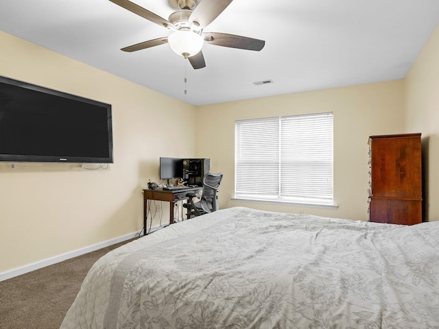 bedroom with ceiling fan and carpet flooring