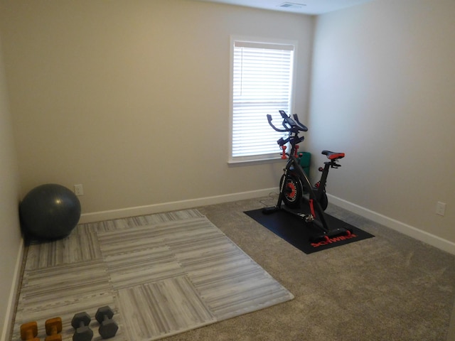 exercise room with carpet floors