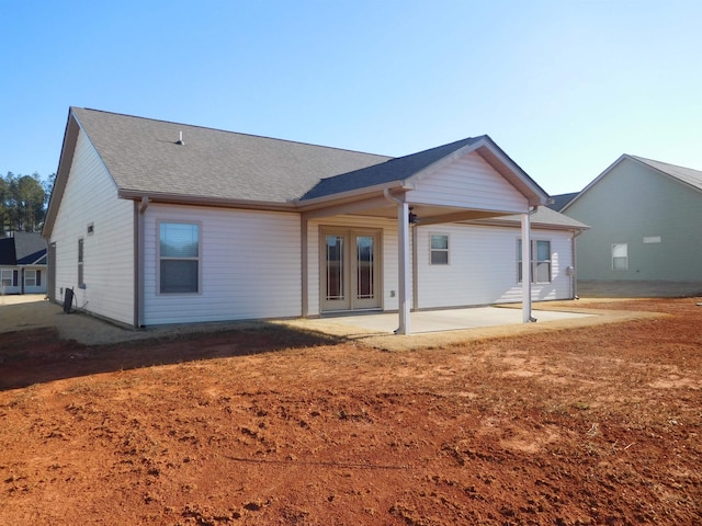 back of property with a patio area