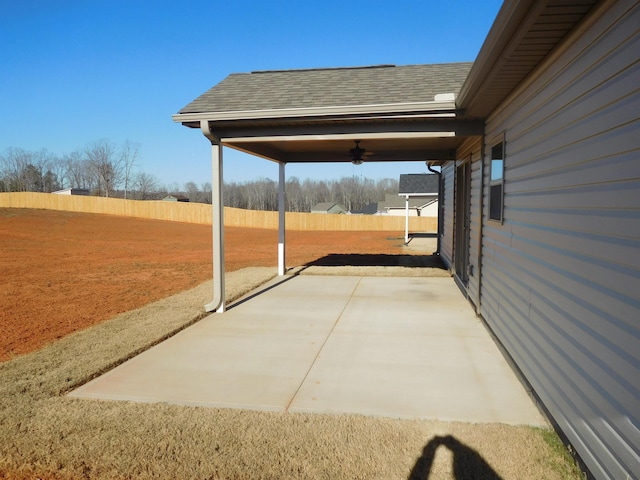 view of patio featuring ceiling fan