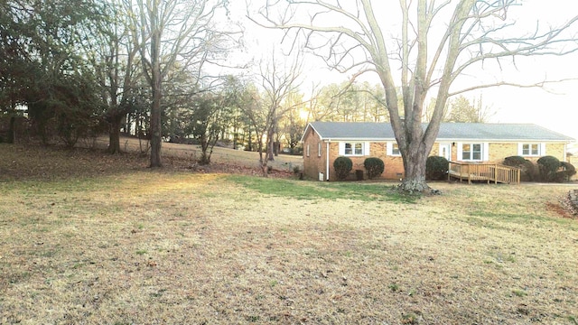 view of yard with a deck