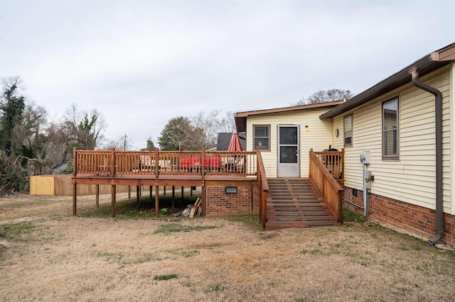 view of yard with a wooden deck