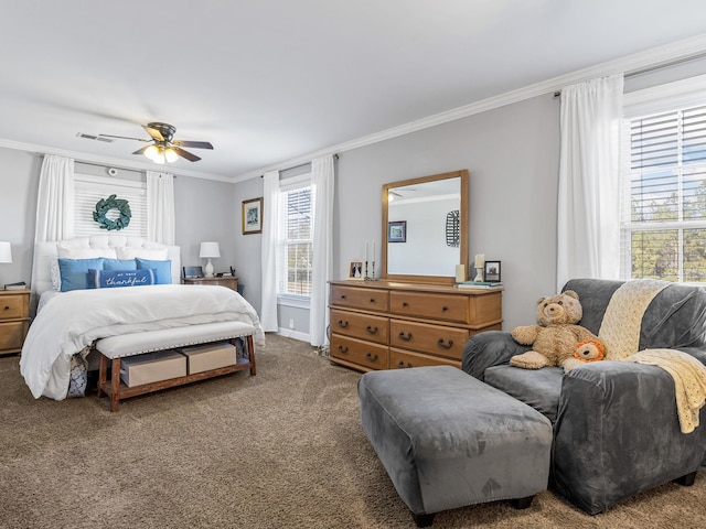 bedroom featuring crown molding, carpet floors, and ceiling fan