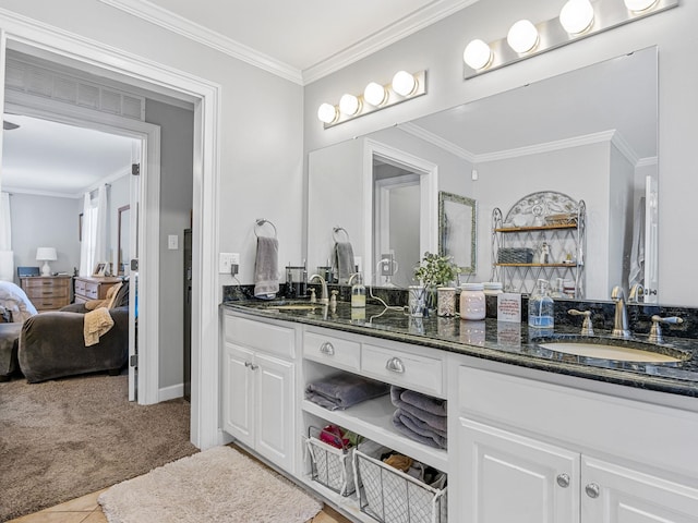 bathroom featuring vanity, tile patterned floors, and ornamental molding