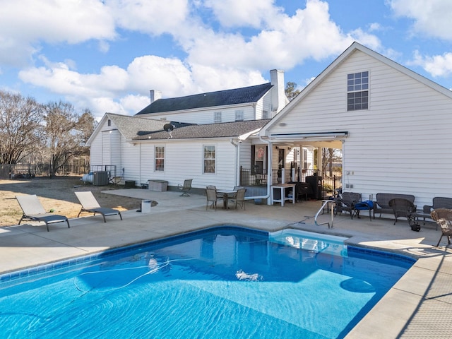 view of pool with a patio area