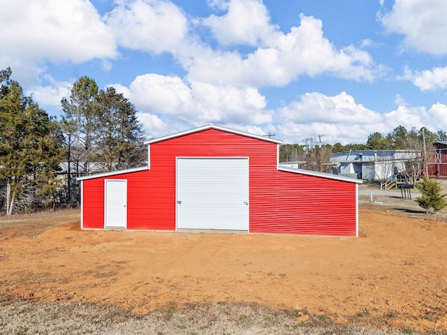 view of outbuilding with a garage