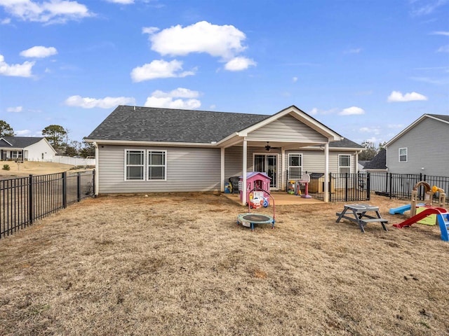 view of front of property with ceiling fan and a patio area