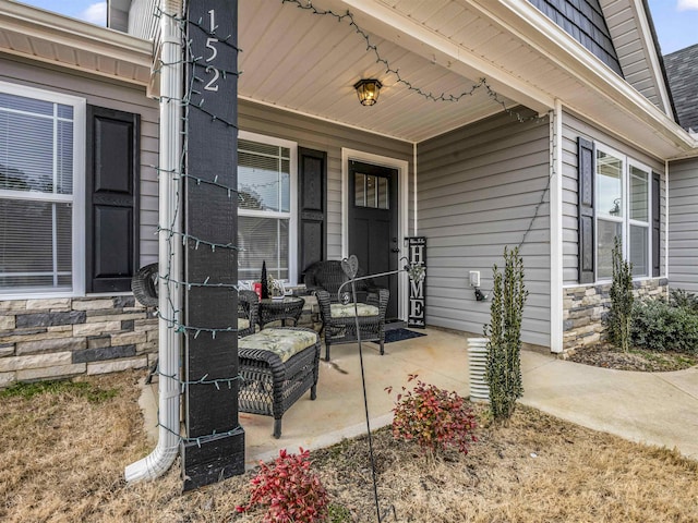 property entrance featuring covered porch