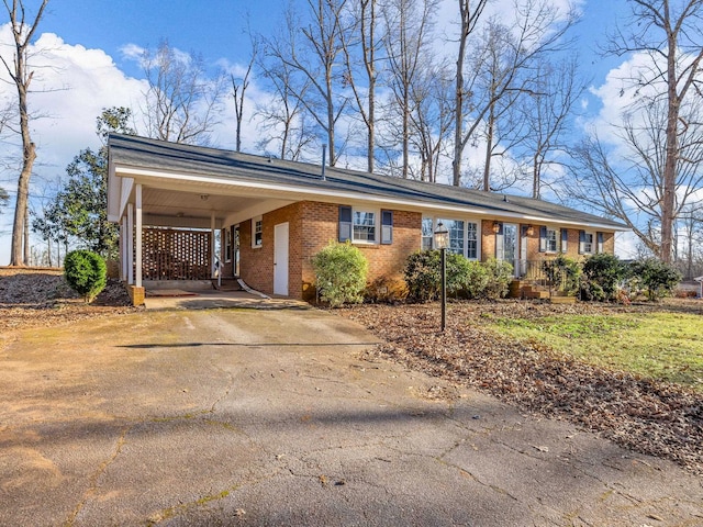 ranch-style house with a carport