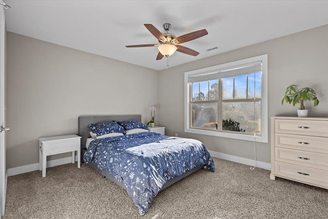 bedroom with ceiling fan and carpet flooring