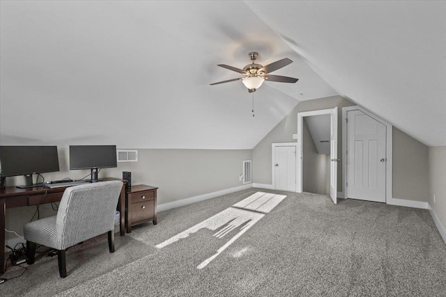 carpeted office featuring lofted ceiling and ceiling fan