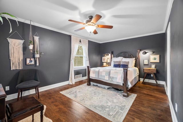 bedroom featuring ornamental molding, dark hardwood / wood-style floors, and ceiling fan