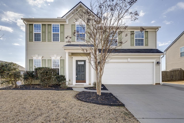 view of front of property with a garage