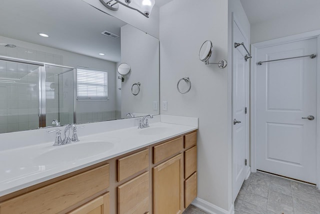 bathroom featuring vanity and walk in shower